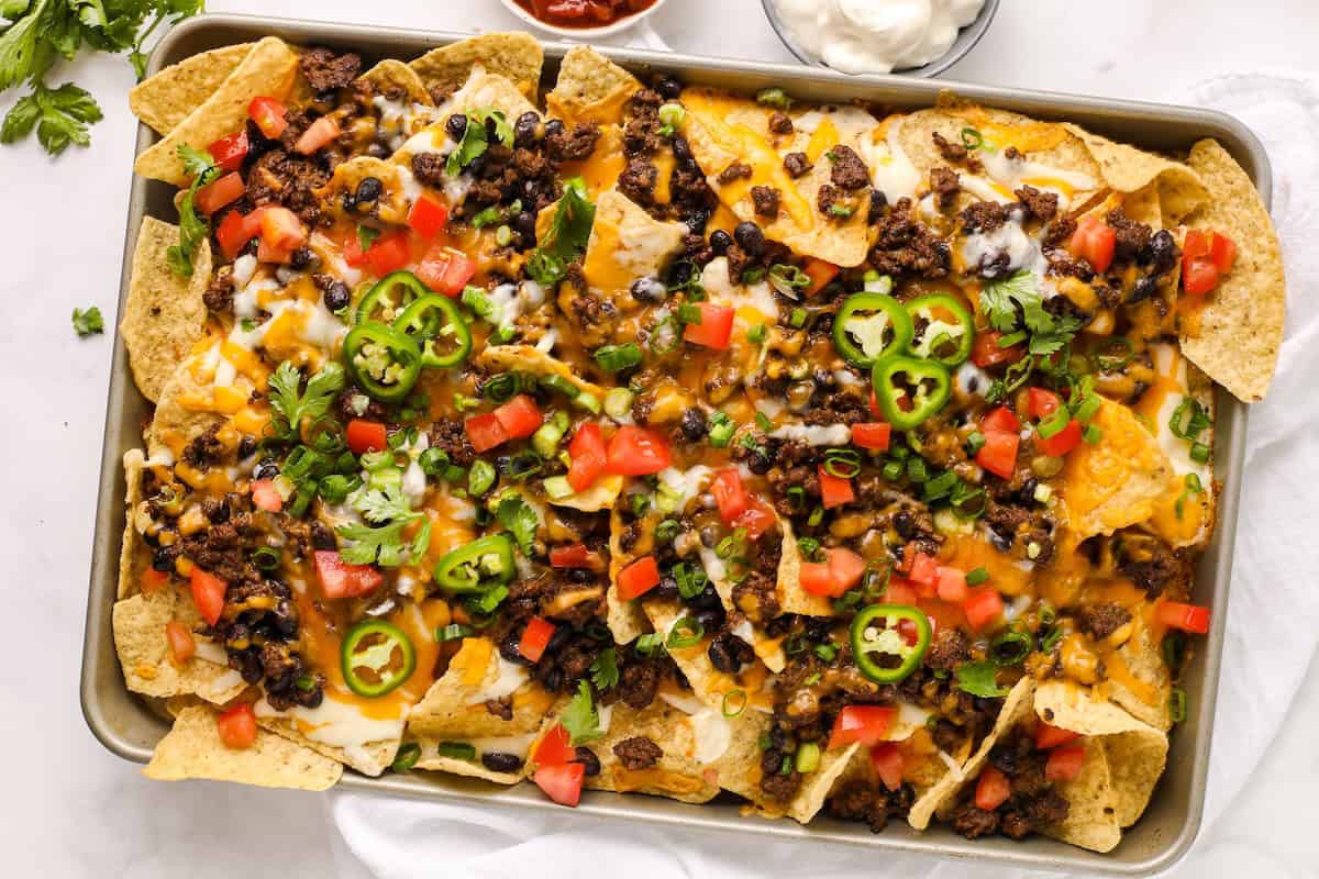 Homemade Taco Nachos: Savory Beef, Melted Cheese, & Custom Toppings